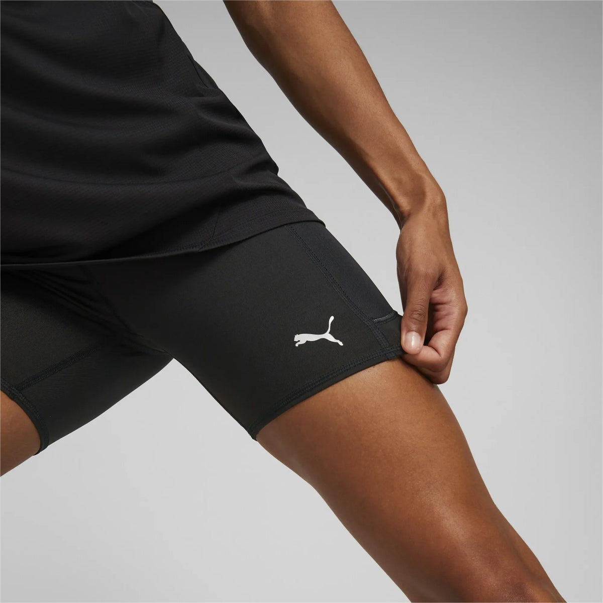 Puma Women&#39;s RUN Favorite Black Athletic Short Tights for Performance Training