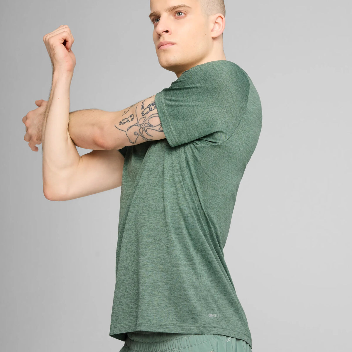 Puma Men&#39;s Essentials Heather Cat Tee: Green Moon, Moisture-Wicking Performance T-Shirt